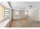 Spacious bedroom with a bay window and carpeting, needs some updating and restoration at 1810 Maryland Ne Ave, St Petersburg, FL 33703