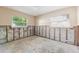 Bedroom showing partially demolished walls and two windows at 1810 Maryland Ne Ave, St Petersburg, FL 33703