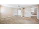 Bedroom with closet, carpeting, and doorway. Needs painting and restoration at 1810 Maryland Ne Ave, St Petersburg, FL 33703