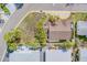 Aerial view highlighting property lines and showcasing the home's location within a residential area at 18198 3Rd E St, Redington Shores, FL 33708