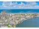 Beautiful beach community view with oceanfront condos and private boat docks along a canal at 18198 3Rd E St, Redington Shores, FL 33708