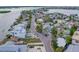 Desirable waterfront property featuring lush greenery, mature trees, and a serene location near beautiful bay views at 18198 3Rd E St, Redington Shores, FL 33708