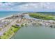 Beautiful aerial view of the coastline, beach, and the waterway where the property is located at 18198 3Rd E St, Redington Shores, FL 33708