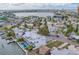 Waterfront community with quaint homes, mature trees, and convenient access to bay amenities for a relaxing lifestyle at 18198 3Rd E St, Redington Shores, FL 33708