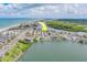 Aerial view of the coastal community with the home's location conveniently located between the beach and waterway at 18198 3Rd E St, Redington Shores, FL 33708