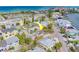 Aerial view showing waterfront community with beach access and boating opportunities at 18198 3Rd E St, Redington Shores, FL 33708