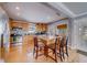 Well-appointed kitchen features stainless appliances, granite counters, and a center island with barstool seating at 18198 3Rd E St, Redington Shores, FL 33708