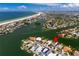 An aerial view of the community shows the beautiful surrounding waterways at 243 Hermosita Dr, St Pete Beach, FL 33706