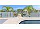 Waterfront living with a private dock, beautiful landscaping, and direct access to the bay at 243 Hermosita Dr, St Pete Beach, FL 33706