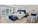 Cozy primary bedroom with a plush bed, and private access to a pool at 243 Hermosita Dr, St Pete Beach, FL 33706