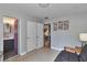 Bedroom with open doorways shows access to bathroom and other areas of the house at 2933 Stratford Dr, Largo, FL 33771
