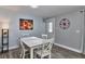 Bright dining area with white table set and stylish accents at 2933 Stratford Dr, Largo, FL 33771