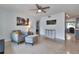 Inviting living room featuring neutral tones, comfortable seating, and views into other rooms of the home at 2933 Stratford Dr, Largo, FL 33771
