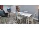 Open floor plan seamlessly integrates the living area with the dining space at 2933 Stratford Dr, Largo, FL 33771