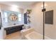 Bathroom featuring unique decor, shelves, and a bathtub at 3300 58Th N St, St Petersburg, FL 33710