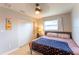 Bedroom featuring a ceiling fan and neutral paint at 3300 58Th N St, St Petersburg, FL 33710