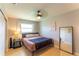 Bedroom featuring a ceiling fan and neutral paint at 3300 58Th N St, St Petersburg, FL 33710