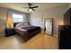 Comfortable bedroom with ceiling fan, closet and dresser at 3300 58Th N St, St Petersburg, FL 33710
