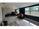 Spacious bonus room featuring light tile floor, ample light, and casual furniture at 3300 58Th N St, St Petersburg, FL 33710