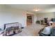 View of the bonus room with tile flooring, neutral paint, and furniture at 3300 58Th N St, St Petersburg, FL 33710
