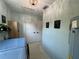 Open laundry room with washer and dryer and access to additional rooms at 3300 58Th N St, St Petersburg, FL 33710
