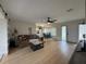 Open living room featuring modern furniture, light floors, and ample natural light at 3300 58Th N St, St Petersburg, FL 33710