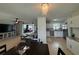 Spacious and well-lit open-concept living area connecting the kitchen, dining, and Gathering rooms at 3300 58Th N St, St Petersburg, FL 33710