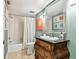 Cozy bathroom with vanity, shower/tub combination, and tasteful decor at 3304 Latania Dr, Tampa, FL 33618