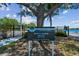 Sign for the private White Sands Beach in Original Carrollwood neighborhood, with gated beach entrance visible at 3304 Latania Dr, Tampa, FL 33618