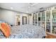 Spacious bedroom with hardwood floors and built-in bookcase at 3304 Latania Dr, Tampa, FL 33618