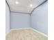 A bright, empty room featuring recessed lighting and tile floors is ready for customization at 3304 Latania Dr, Tampa, FL 33618