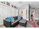 Cozy living room with a leather sofa and ottoman at 3304 Latania Dr, Tampa, FL 33618