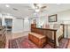 Cozy main bedroom offers a sliding barn door, and decorative rug, and is brightly lit at 3304 Latania Dr, Tampa, FL 33618