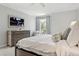 Comfortable bedroom showcasing a large dresser and a serene ambiance at 3619 W Leona St, Tampa, FL 33629