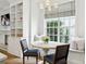 Cozy breakfast nook with a round table, window seating, and natural light at 3619 W Leona St, Tampa, FL 33629