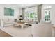 Comfortable living room with a large window and elegant decor provides a welcoming space to relax at 3619 W Leona St, Tampa, FL 33629
