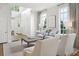 Inviting living room with ample natural light, stylish furniture, and hardwood floors at 3619 W Leona St, Tampa, FL 33629