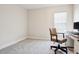 Bright home office features a desk, comfortable chair, and a large window at 3619 W Leona St, Tampa, FL 33629