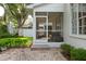Charming screened porch with brick patio, perfect for enjoying outdoor living at 3619 W Leona St, Tampa, FL 33629
