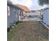 Backyard features a lounge area and hammock, providing the perfect setting for relaxation and outdoor enjoyment at 37535 Laurel Hammock Dr, Zephyrhills, FL 33541