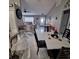 Spacious open-concept living area showcasing modern finishes, neutral colors, and ample natural light at 37535 Laurel Hammock Dr, Zephyrhills, FL 33541