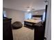 Relaxing bedroom with a king bed, ample storage, and cozy decor for a peaceful retreat at 37535 Laurel Hammock Dr, Zephyrhills, FL 33541
