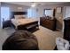 Comfortable bedroom with a king bed, ample closet space, and soft natural light at 37535 Laurel Hammock Dr, Zephyrhills, FL 33541