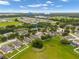 This aerial view shows the neighborhood's proximity to shopping and the Suncoast Parkway entrance for ease of commuting at 396 Winthrop Dr, Spring Hill, FL 34609