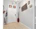 Bright foyer with tile flooring, decorative lighting, and ample space for welcoming guests, creates an inviting entrance at 396 Winthrop Dr, Spring Hill, FL 34609