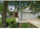 Charming two-story home featuring a two-car garage, well-maintained lawn and mature trees in a Gathering-friendly neighborhood at 396 Winthrop Dr, Spring Hill, FL 34609