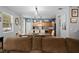 Open concept living space featuring a dining area and kitchen beyond, perfect for entertaining and everyday living at 396 Winthrop Dr, Spring Hill, FL 34609