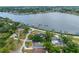 Stunning aerial view of a waterfront home with easy access to the bay and scenic neighborhood views at 401 Whitcomb Blvd, Tarpon Springs, FL 34689