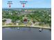 Aerial view of the house with Gulf of America and Howard Park & Beach in the background at 401 Whitcomb Blvd, Tarpon Springs, FL 34689
