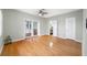 Bright bedroom with hardwood floors, a closet, and access to a balcony at 401 Whitcomb Blvd, Tarpon Springs, FL 34689